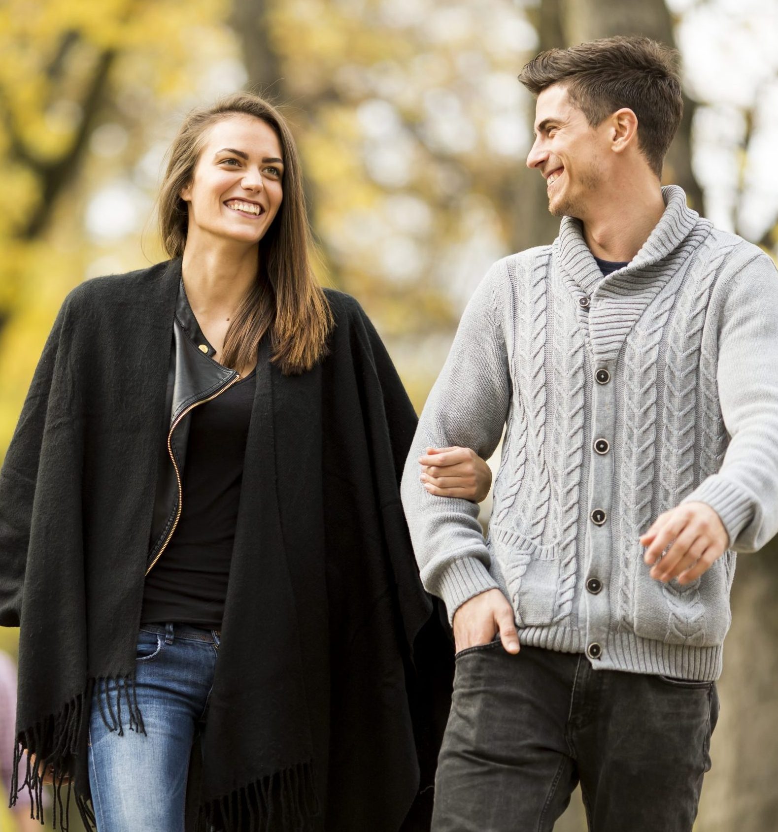 Young people in the autumn park